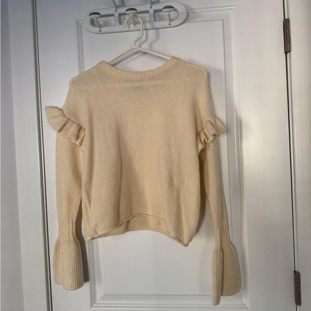 Romeo & Juliet Couture Cream Sweater with Ruffle Accents